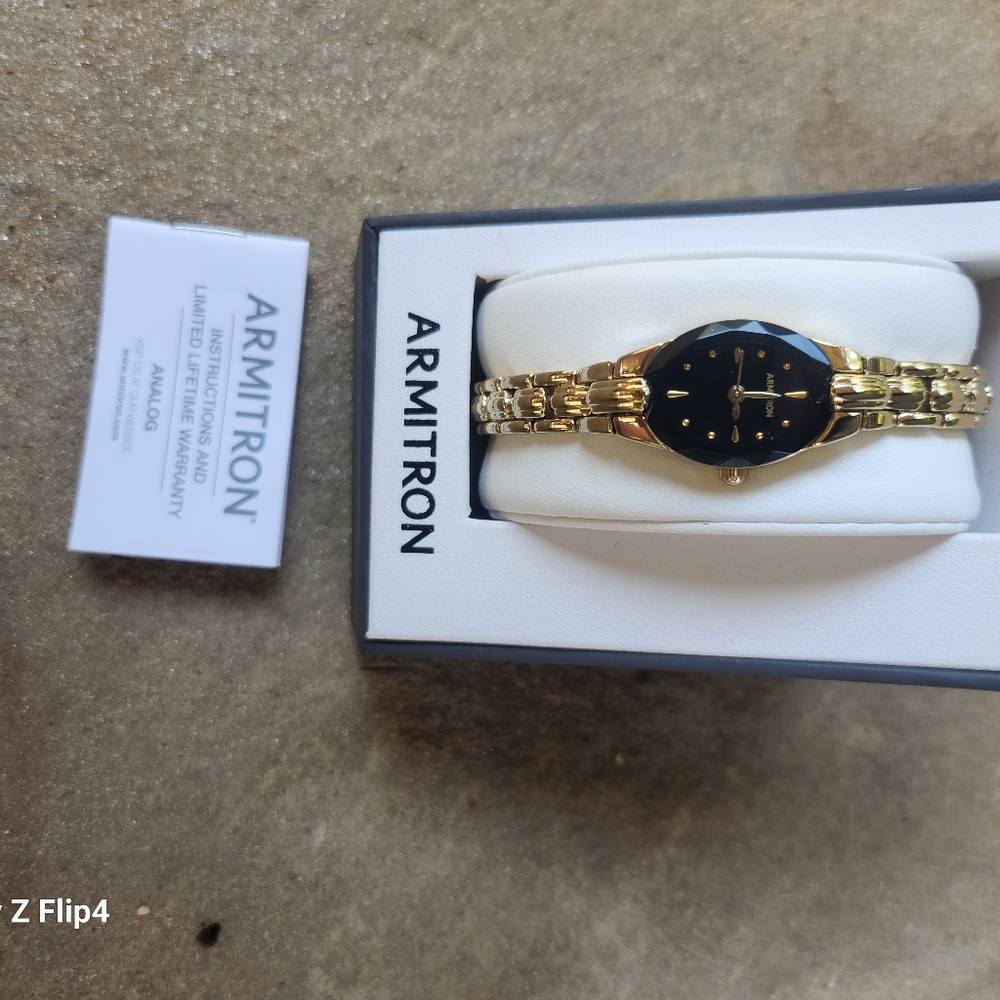 Armitron Watch. Never worn, still in the box with owners manual